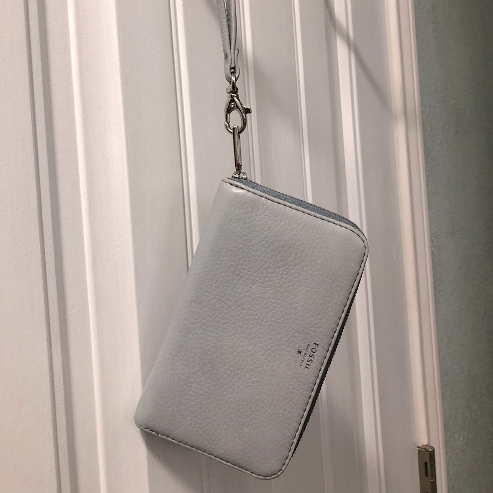 Fossil light blue wallet. Excellent condition, bought and never used.